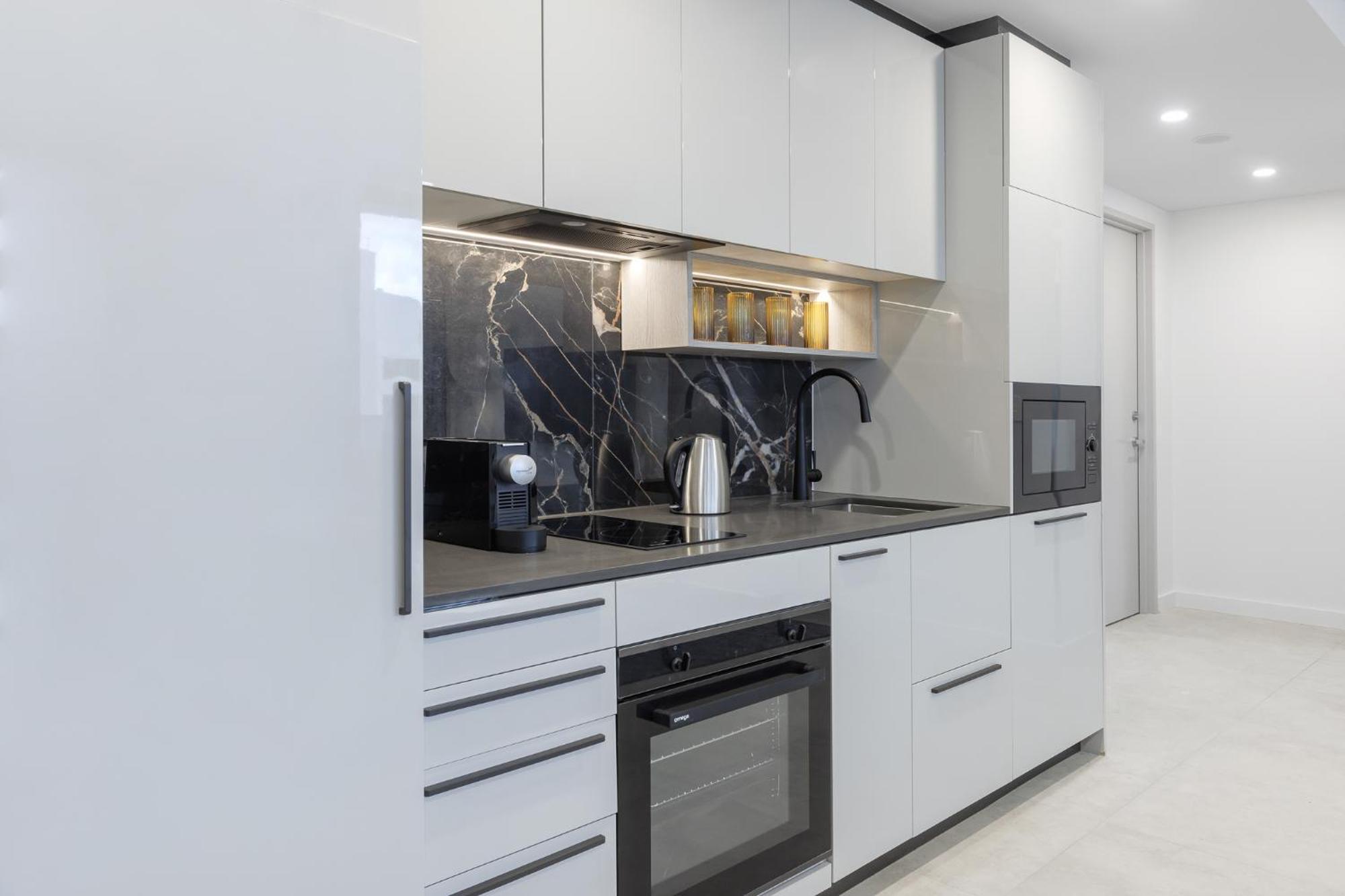 Meriton Suites Canberra Camberra Exterior foto A modern kitchen