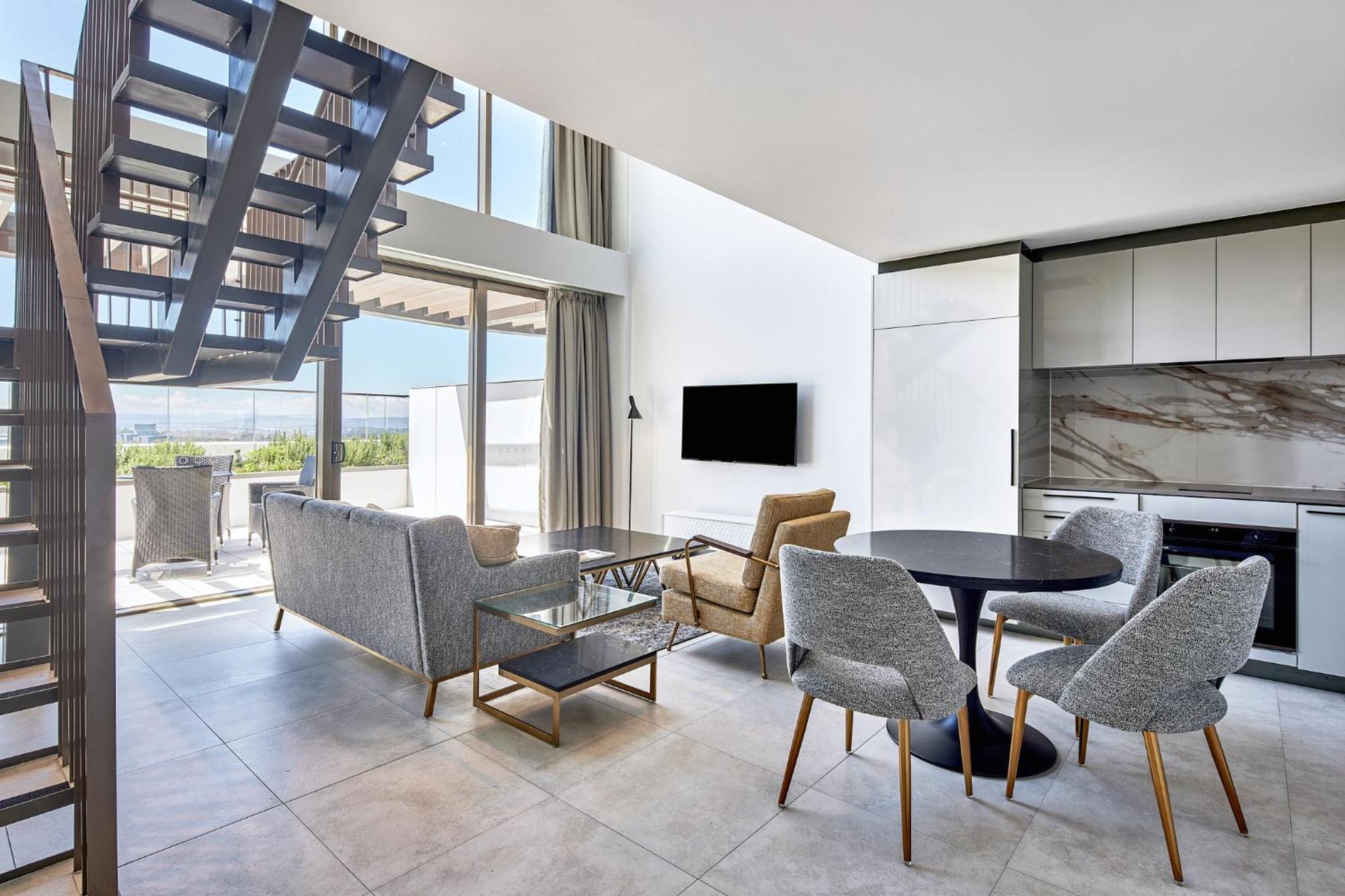 Meriton Suites Canberra Camberra Exterior foto A living room at the hotel
