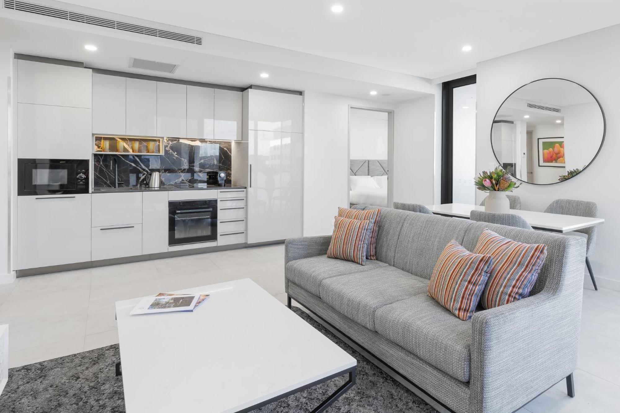 Meriton Suites Canberra Camberra Exterior foto A typical apartment interior