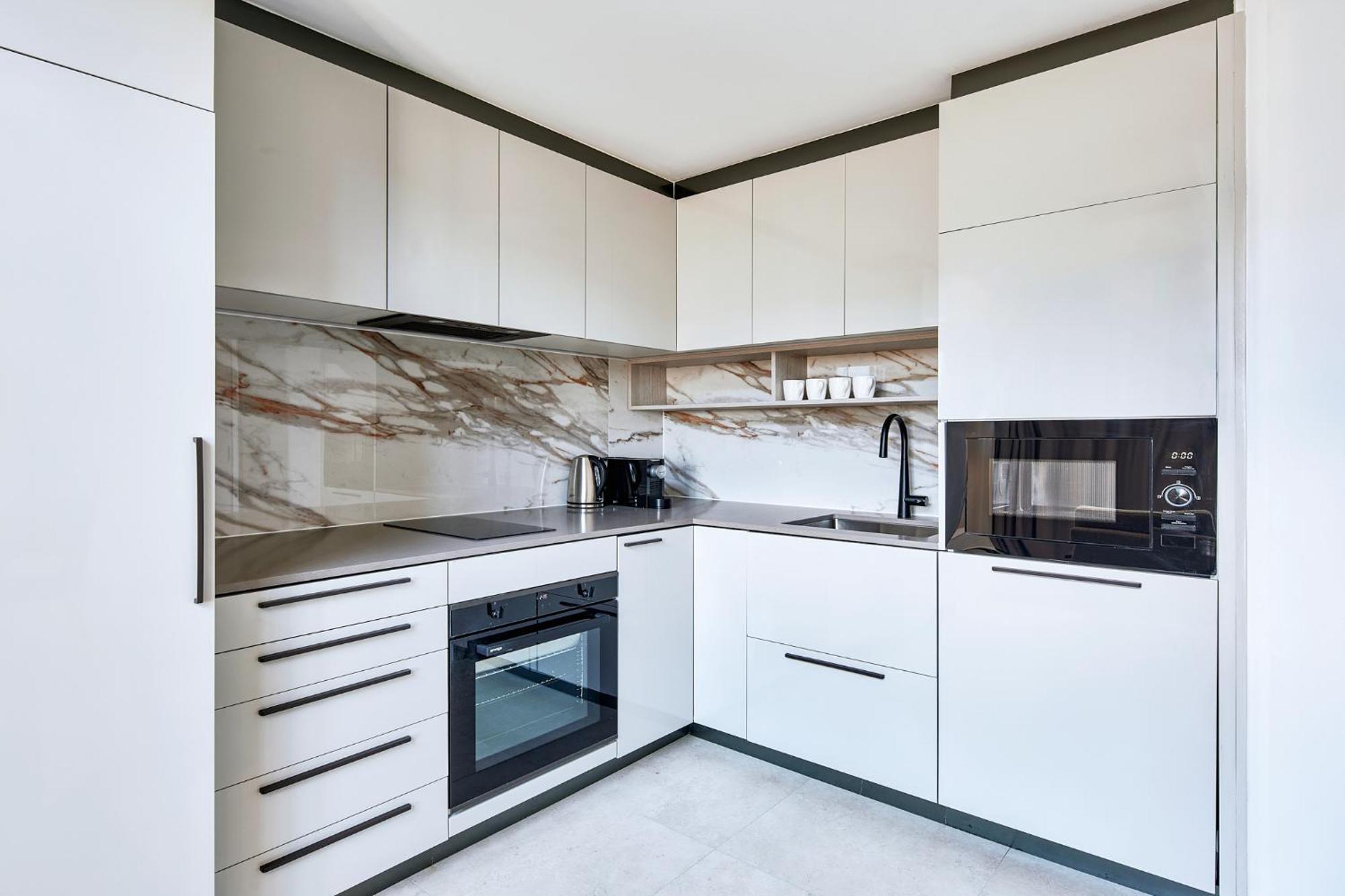 Meriton Suites Canberra Camberra Exterior foto A modern kitchen