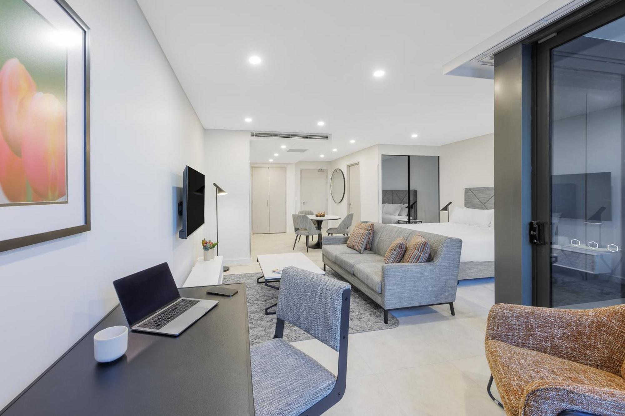 Meriton Suites Canberra Camberra Exterior foto A typical apartment interior