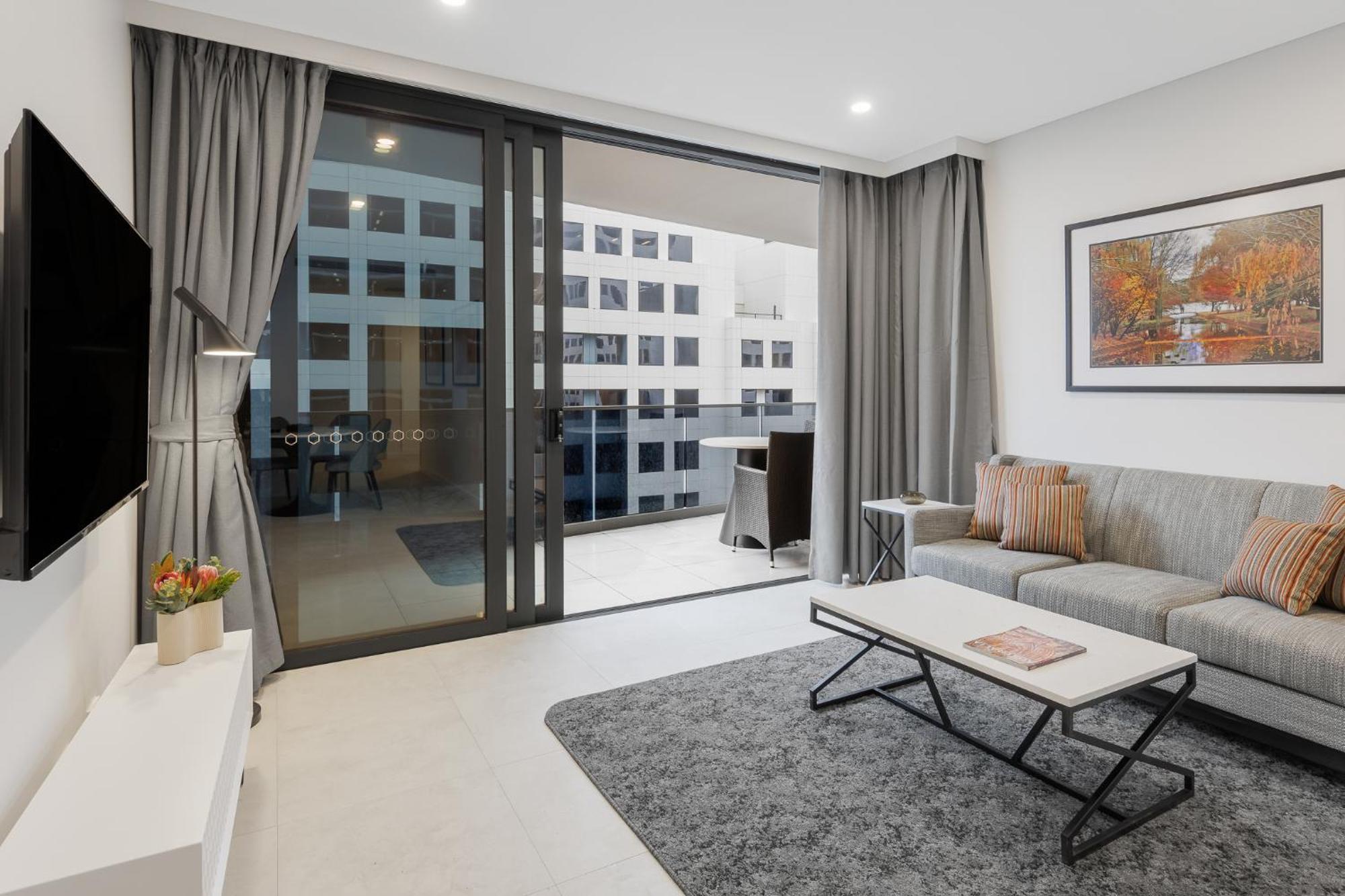 Meriton Suites Canberra Camberra Exterior foto Living room