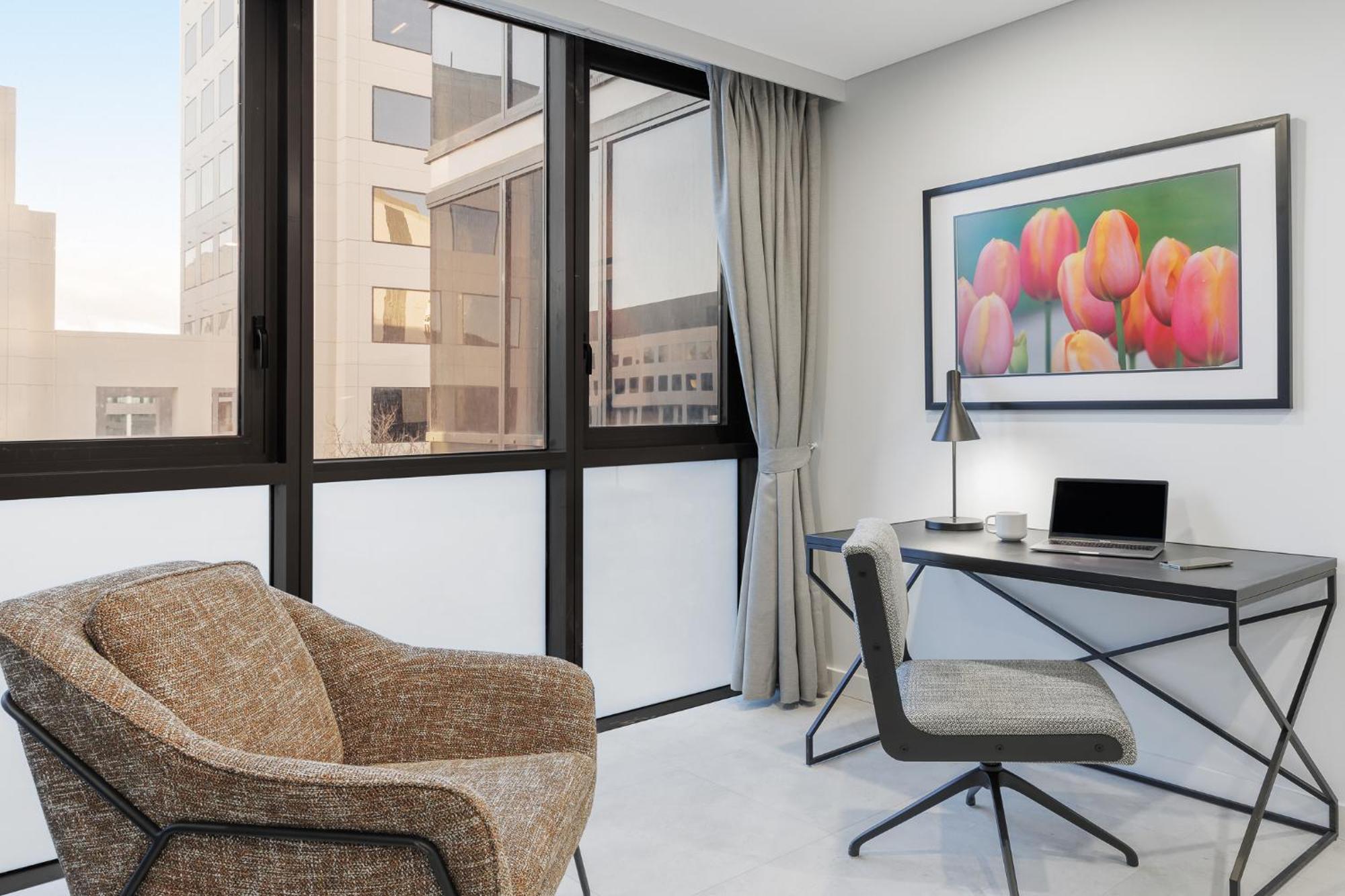 Meriton Suites Canberra Camberra Exterior foto A typical apartment at The Met
