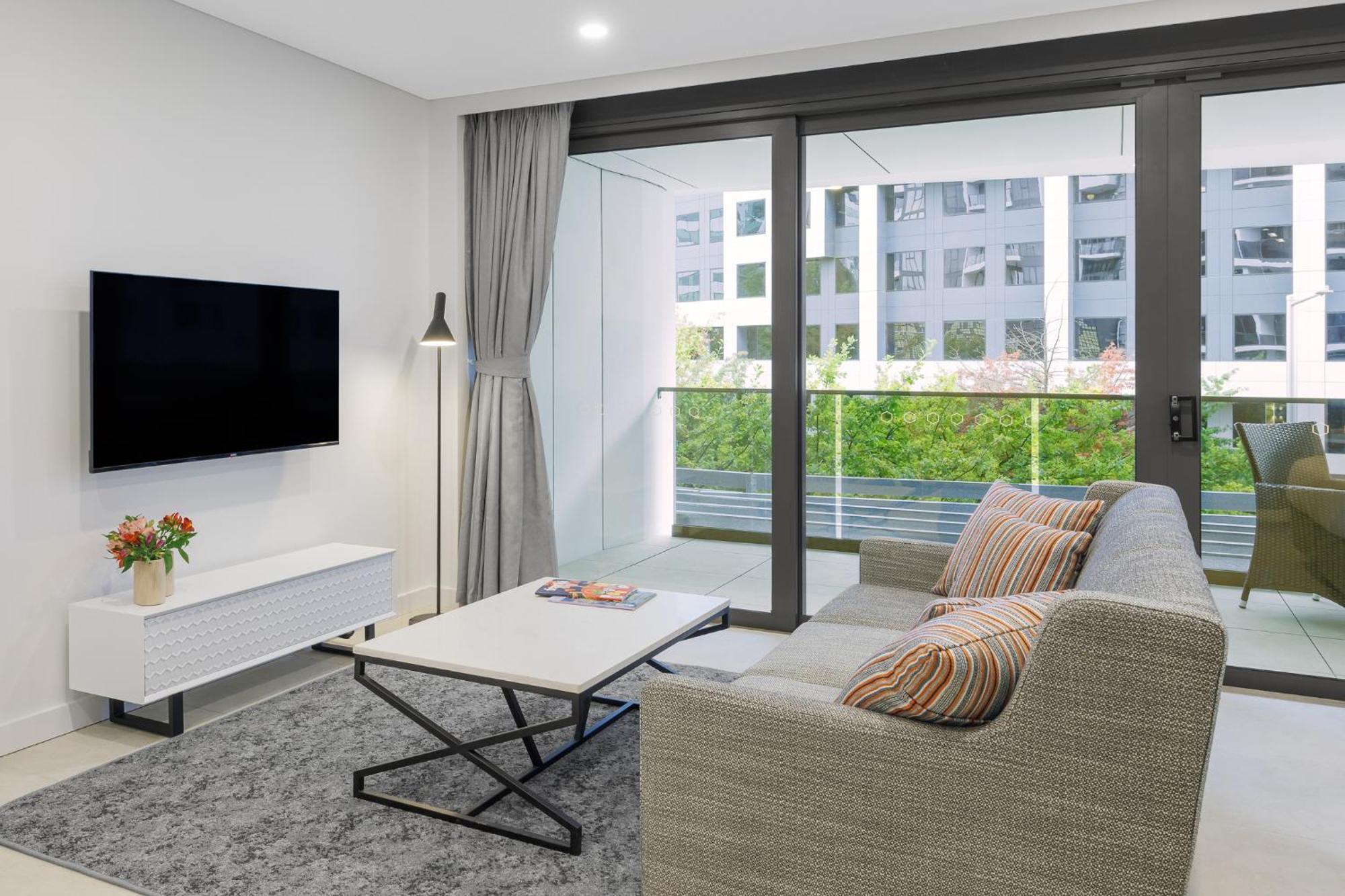 Meriton Suites Canberra Camberra Exterior foto Living room